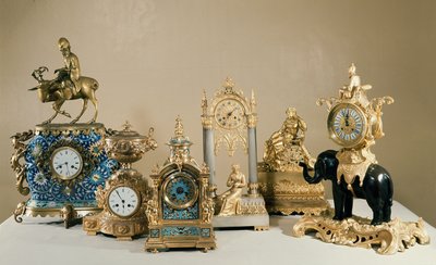 Collection of Pendules de Paris showing the widely differing types of case into which the French movement could be fitted by French School